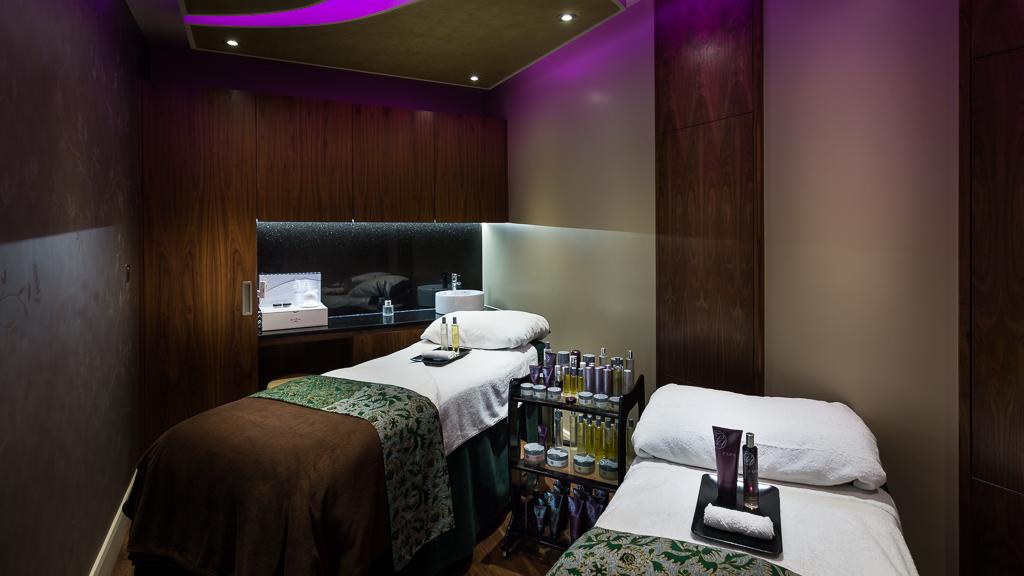 Spa therapy room with two massage beds at Down Hall Eden Spa